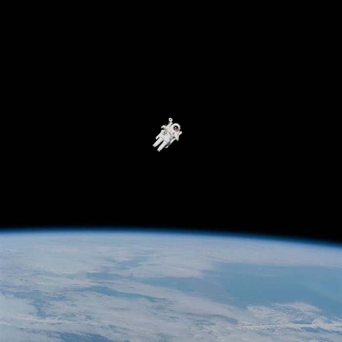 Astronaut in zero gravity poster